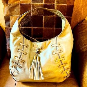 Michael Kors Astor Grommet Hobo bag in gold genuine leather